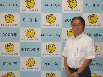 シンボルマークと市長の画像